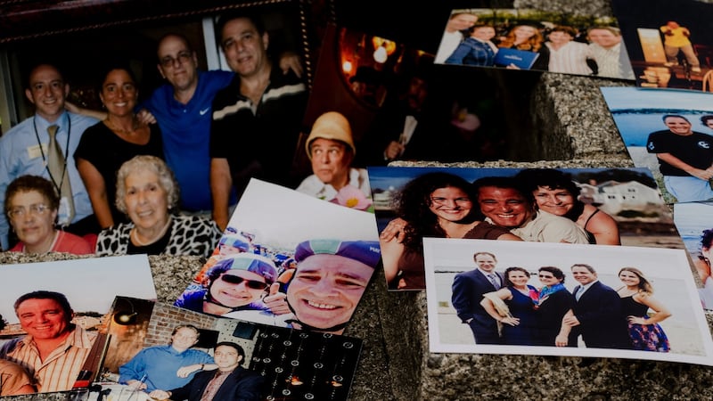 Family photos of Larry Kelly at his home in Manhattan. Photograph: Heather Sten/The New York Times