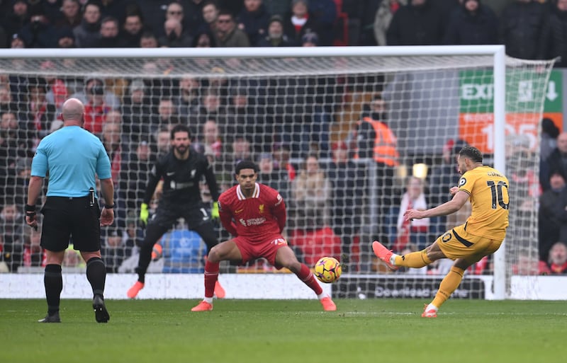 Matheus Cunha scores for Wolves. Photograph: Stu Forster/Getty Images