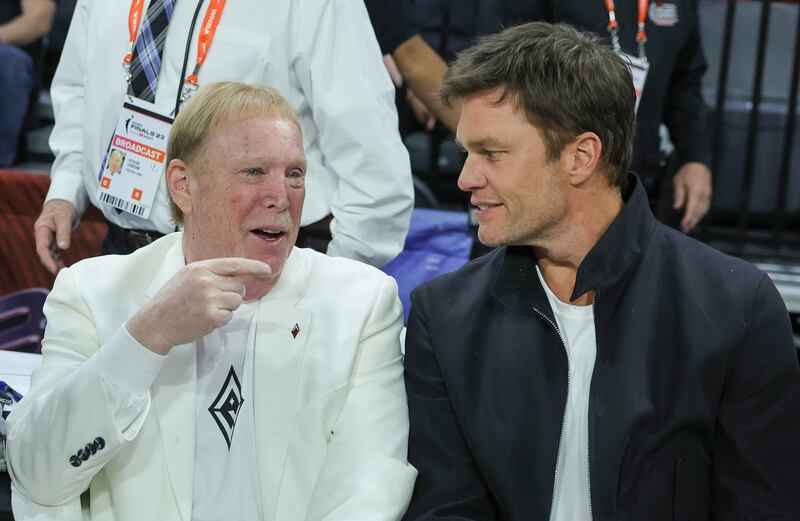 Tom Brady with Las Vegas Raiders owner Mark Davis (left). Photograph: Ethan Miller/Getty Images