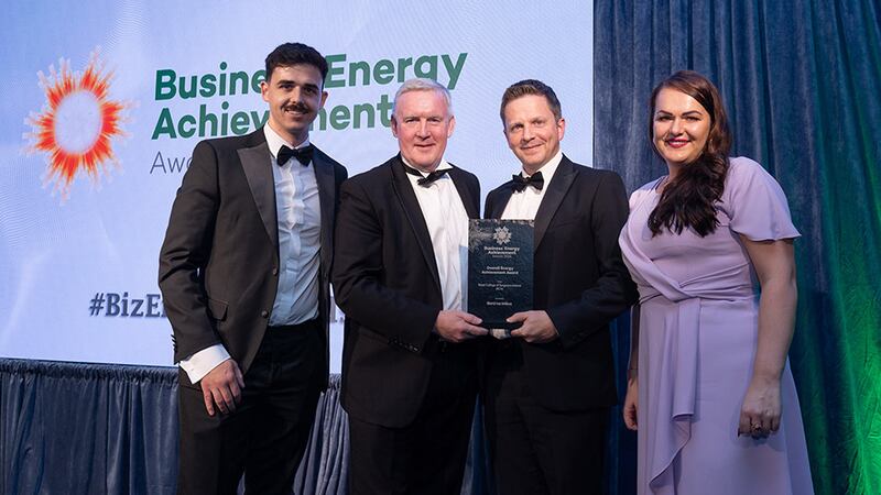 John Reilly, head of renewable energy at Bord na Móna, presents the best energy achievement in healthcare award to Royal College of Surgeons Ireland (RCSI) team