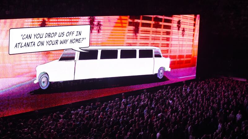 Experience + Innocence: U2 can play inside the barricage, a 20-tonne, 30m elevated walkway, as images are projected on to its sides. Photograph: Chris McKay/Getty Images