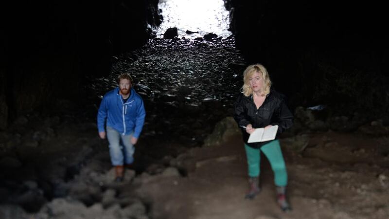 Exploring the sea caves. Photograph: Charles McQuillan/Pacemaker