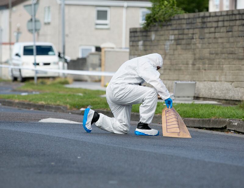 Members of the Gardai at the scene on Rossfield Estate, Tallaght, Dublin on Sunday. Photograph: Gareth Chaney/Collins