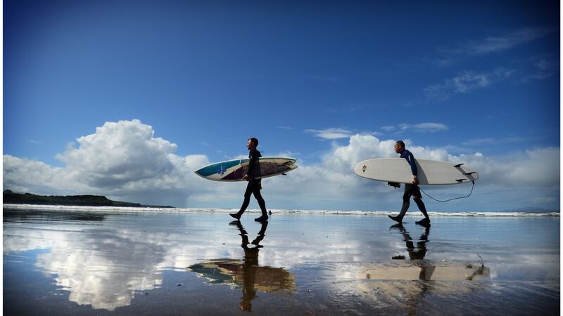 Standalone Surfers on Rossnowlagh beach. Photograph: Bryan O’Brien