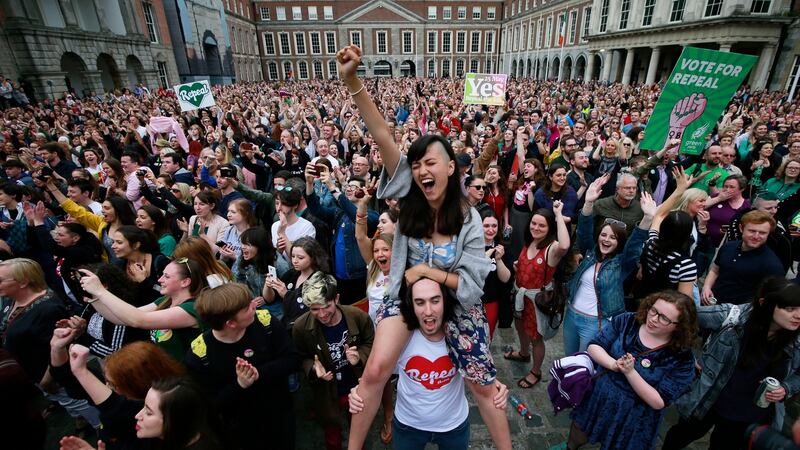 A crowd celebrates the Yes vote at Dublin Castle: “Two-thirds of the electorate voted to remove all rights before birth from the Constitution for the next generation and they did not blink.” Photograph: Nick Bradshaw