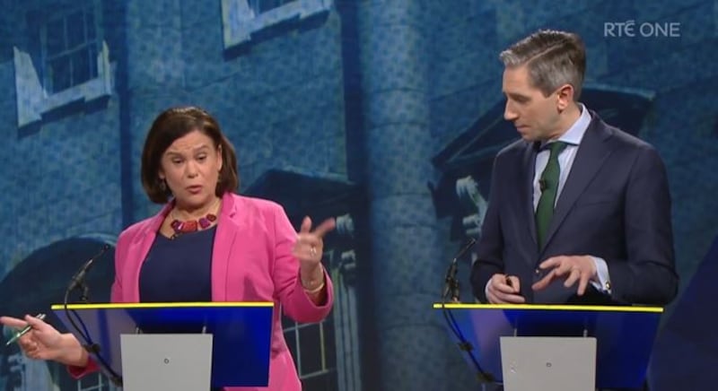 The 'Simon stare': Taoiseach Simon Harris is halted in his tracks by Mary Lou McDonald