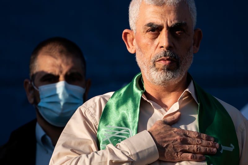 Sinwar on stage after greeting supporters at a May 2021 rally in Gaza City. Photo: John Minchillo/AP