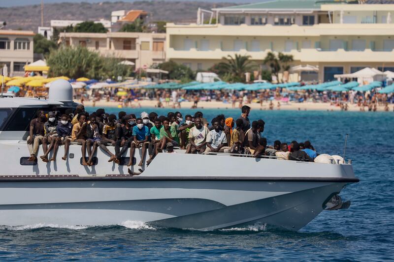 Migrants on an Italian Coast Guard vessel as they are taken to Lampedusa after being rescued at sea in September. Photograph: Cecilia Fabiano/LaPresse/AP