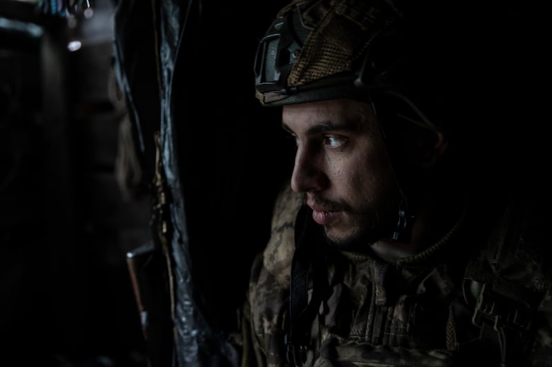 A Ukrainian soldier with the 79th Air Assault Brigade waits in a bunker along the front line in an area of Marinka, in eastern Ukraine. Photograph: Tyler Hicks/New York Times