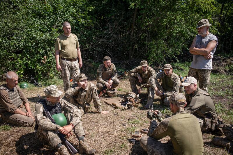 Ukrainian marines training to spot and disarm mines and booby traps  in southeast Ukraine. Photograph: Diego Ibarra Sanchez/The New York Times)