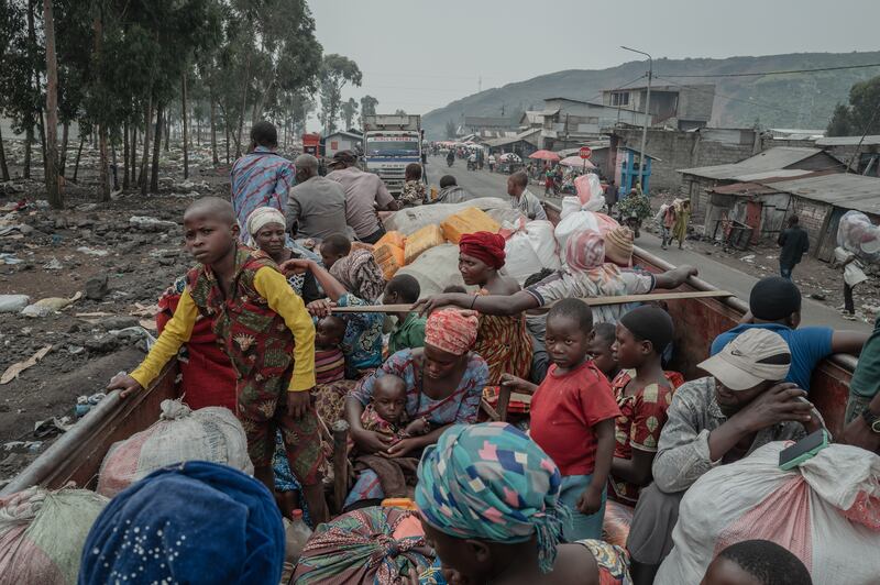 Displaced families ride in trucks as they return to their homes in Kanyaruchinya, north of Goma, on February 2nd. Photograph: Guerchom Ndebo/New York Times