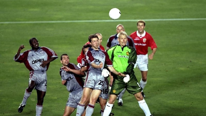 Manchester United goalkeeper Peter Schmeichel challenges Thomas Linke in the Bayern Munich penalty area during the Champions League final at the Nou Camp in Barcelona on May 26th, 1999. United scored twice in injury-time to win 2-1. Photograph: Gary M Prior/Allsport