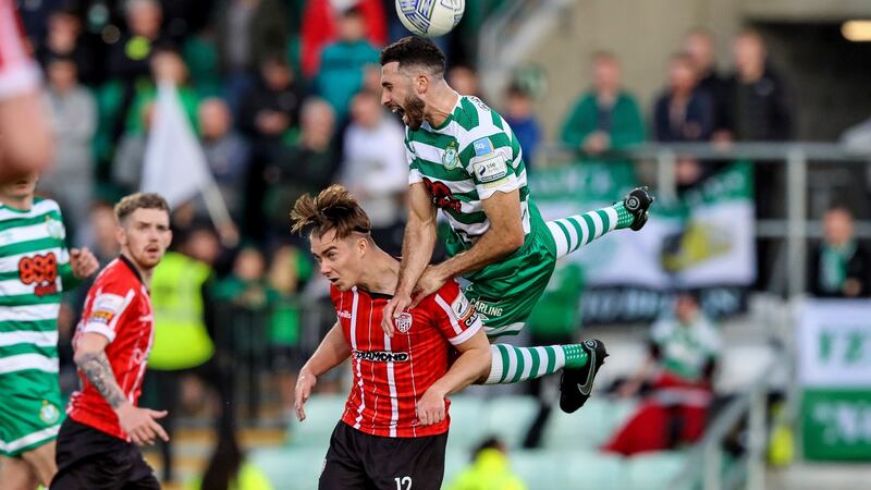 Shamrock Rovers’ Roberto Lopes and Matty Smith of Derry City in action at Tallaght Stadium on Friday night. Photograph: Evan Treacy/Inpho