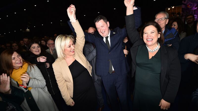 Sinn Féin candidate John Finucane celebrates his victory over DUP candidate Nigel Dodds alongside Sinn Féin president Mary Lou McDonald and Sinn Féin Northern leader Michelle ONeill. Photograph: Charles McQuillan/Getty Images