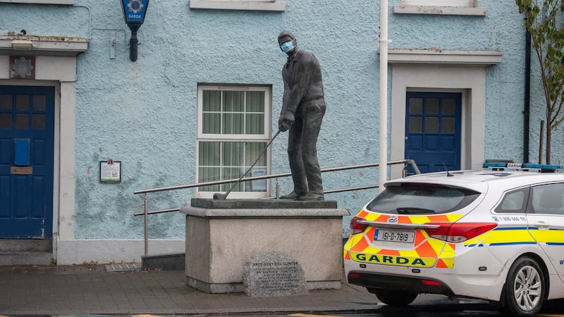 A statue of former US president Bill Clinton, which is currently wearing a mask, on Main Street, Ballybunion . Photograph: Domnick Walsh