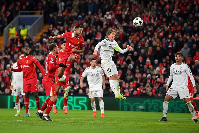 Cody Gakpo scores Liverpool's second goal against Real Madrid under pressure from Luka Modric. Photograph: Justin Setterfield/Getty Images