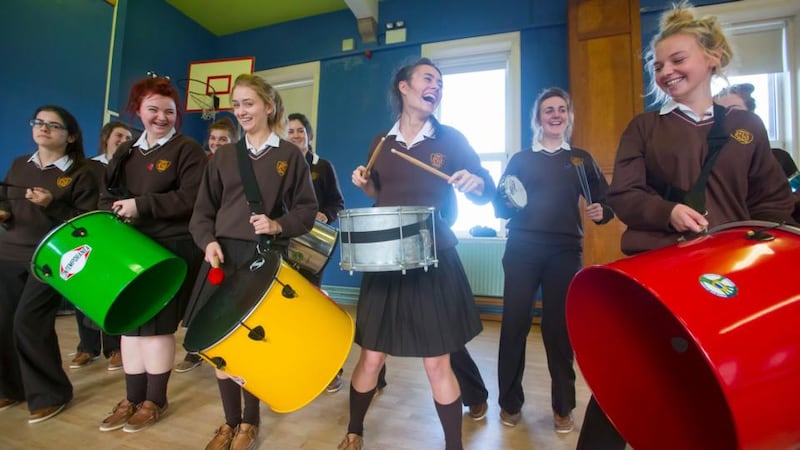 6th year students drum for stress relief at a stress-management workshop for exam year students. Photograph: Patrick Browne