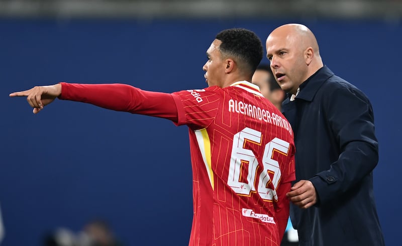 Liverpool's Trent Alexander-Arnold (left) and manager Arne Slot. Photograph: PA Wire via DPA