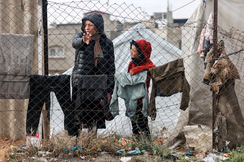 A woman and a child in Rafah. Photograph: Mohammed Abed/AFP via Getty Images