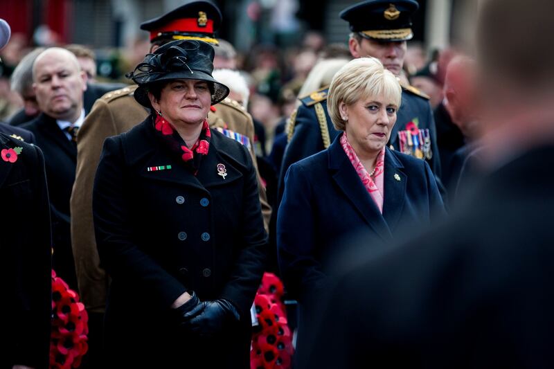 DUP leader Arlene Foster (left) and Heather Humphreys Irish Minister for Business, Enterprise and Innovation at the Enniskillen Cenotaph during Remembrance Sunday in Enniskillen, Co Fermanagh Photograph: Liam McBurney/PA Wire