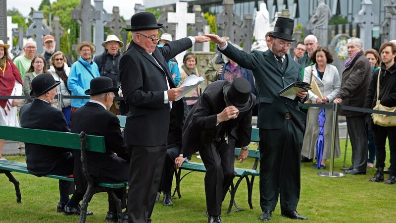 The Joyce Stagers during a performance from Ulysses at Glasnevin cemetery. Photograph: Frank Miller / The Irish Times