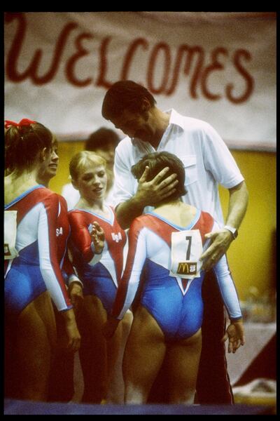 Mary Lou Retton of the US is embraced by her coach Béla Károlyi. Photograph: Tony Duffy/Getty Images