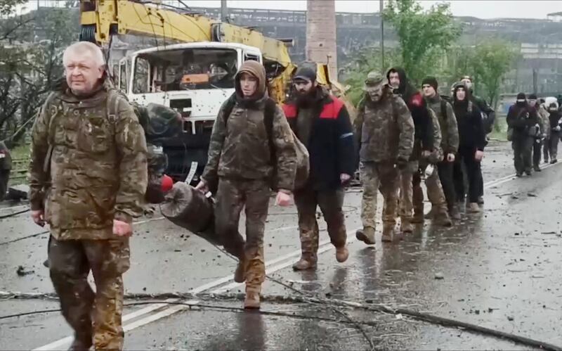 Ukrainian servicemen leave the Azovstal steel plant in Mariupol. Photograph: Russian Defence Ministry Press Service/AP