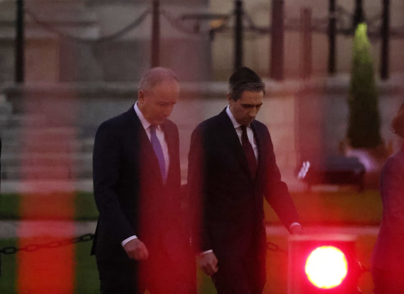 Micheál Martin and Simon Harris preparing to speak to media outside Government Buildings after a day of unrest in the Dáil and a cancelled vote for taoiseach. Photograph: Alan Betson 
