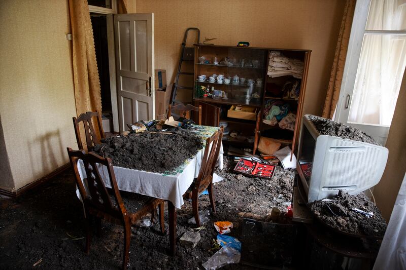 Damage from a missile strike at an apartment in Chasiv Yar, a small town west of Bakhmut on Tuesday. Photograph: Tyler Hicks/The New York Times
                      