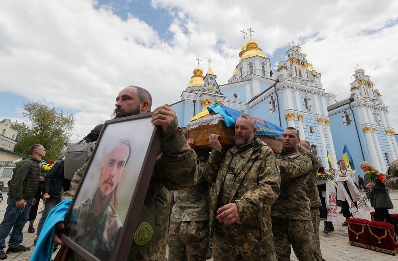 Comrades of late Ukrainian serviceman Danylo Denysevych carry his coffin during his funeral outside the St Mykhailivsky Cathedral in Kyiv this week. Photograph: Sergey Dolzhenko/EPA-EFE