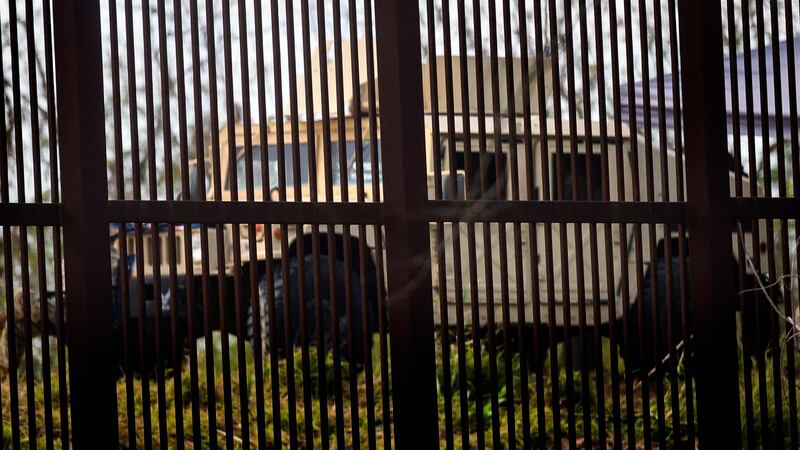 A Texas National Guard Humvee stands watch just on the other side of the border fence in Brownsville, Texas. Photograph: Jim Watson/AFP via Getty