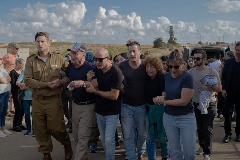 The parents of Gil Avital, who died during the October 7th attack by Hamas, at his funeral in Even Yehuda, Israel, on Sunday. Photograph: Amit Elkayam/New York Times
                      