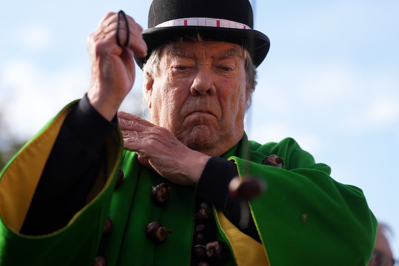 Conqueror: David Jakins takes part in the annual World Conker Championships at the Shuckburgh Arms in Southwick, Peterborough.  Photograph: Jacob King/PA Wire