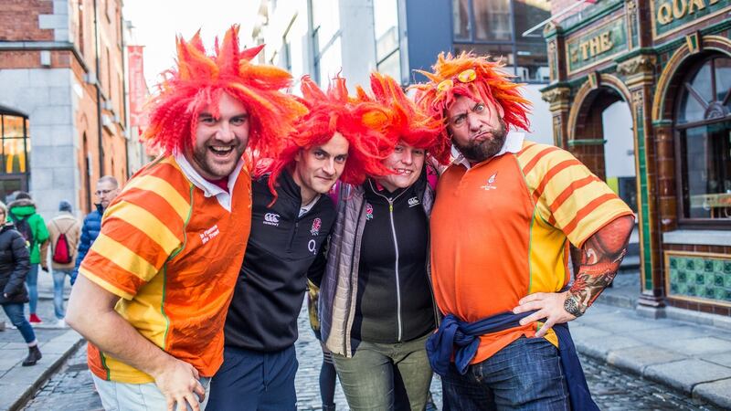 British fans Russel Clarke, Peter Holian, Laura Holian and Phil Erenenko  in Temple Bar, Dublin ahead of the  rugby match. Photograph: James Forde