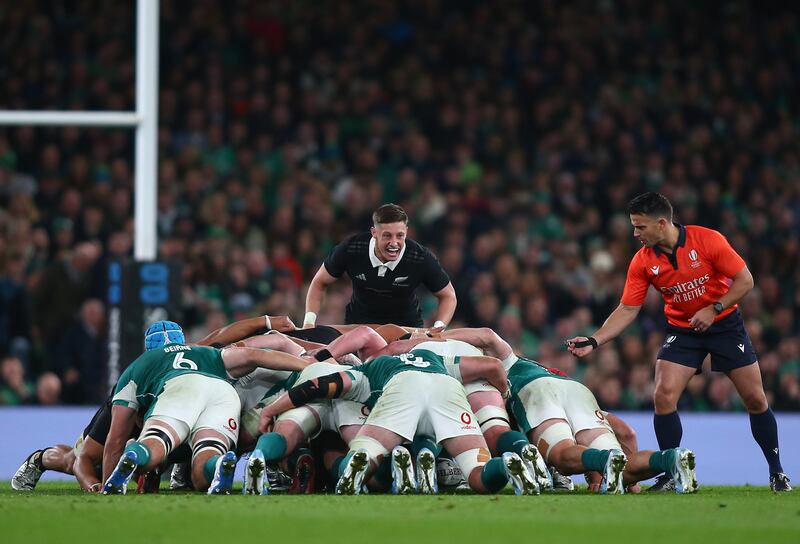 New Zealand's Cam Roigard encourages his pack during a scrum. Photograph: Ken Sutton/Inpho