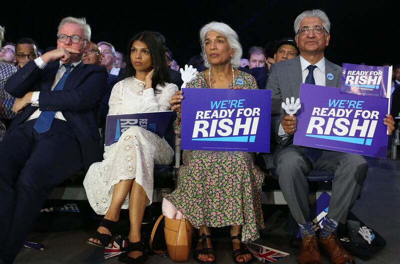 Akshata Murthy, wife of Rishi Sunak, sits with his parents Usha Sunak and Yashvir Sunak, and Conservative MP Michael Gove. Photograph: Susannah Ireland/AFP