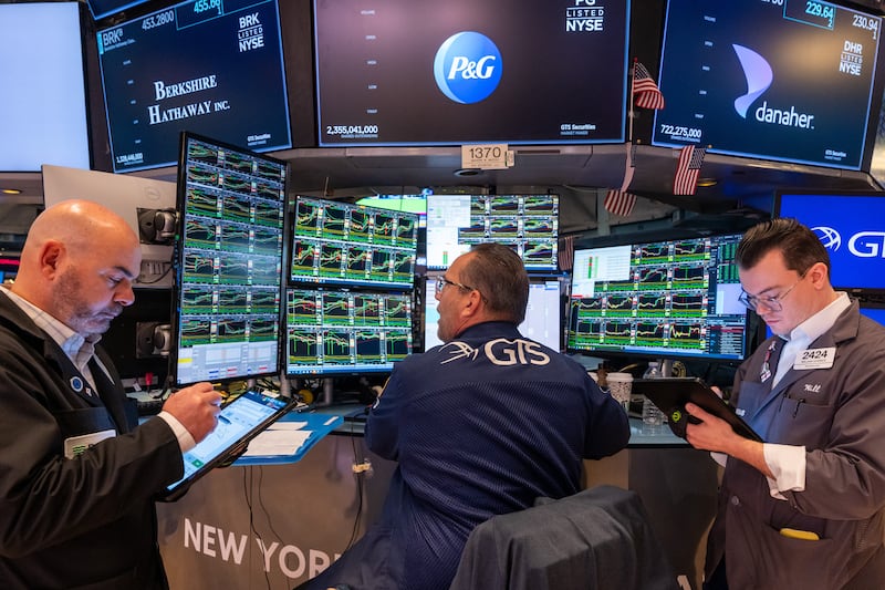 Traders work on the floor of the New York Stock Exchange. Photograph: Spencer Platt/Getty