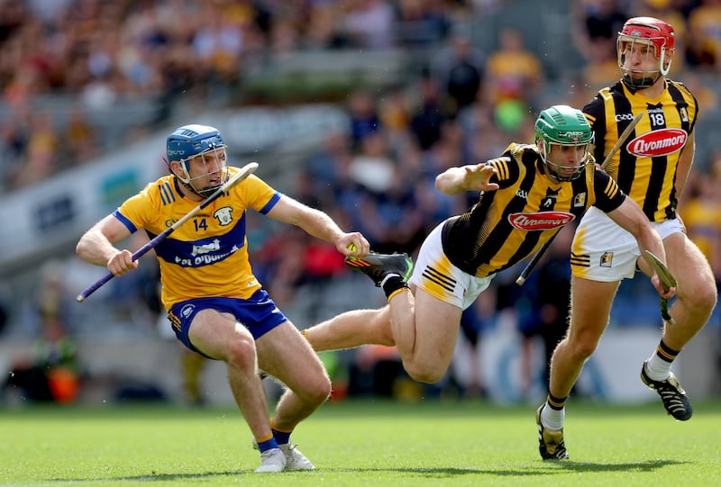 Shane O'Donnell goes past Tommy Walsh of Kilkenny to score Clare's opening goal in July. Photograph: James Crombie/Inpho