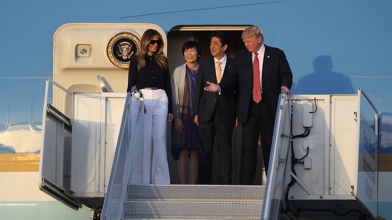 US president Donald Trump and his wife Melania Trump arrive with Japanese prime minister Shinzo Abe and his wife Akie Abe on Air Force One at the Palm Beach International Airport as they prepare to spend part of the weekend together at Mar-a-Lago resort on February this year.  Photograph:  Joe Raedle/Getty Images