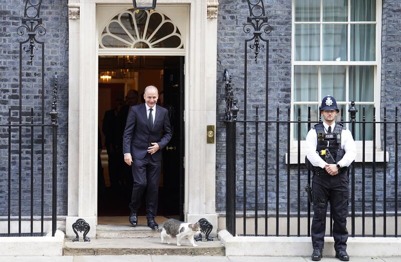 The Taoiseach tries to stroke Larry the cat as he leaves 10 Downing Street in London after meeting UK prime minister Liz Truss. Photograph: Stefan Rousseau/PA