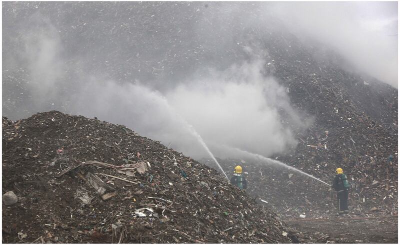 Firefighters attempt to control an underground fire at the landfill site, Kerdiffstown, near Naas, Co Kildare in 2011. The HSE was called in to monitor air quality polluted by the toxic smoke. File photograph: Brenda Fitzsimons/The Irish Times