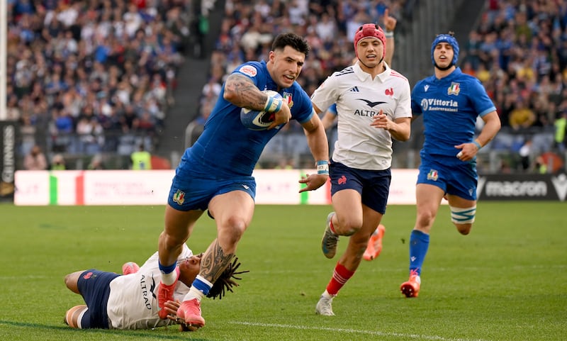 Italy's Tommaso Menoncello runs in for his try against France in this year's Six Nations. Photograph: Giuseppe Fama/Inpho