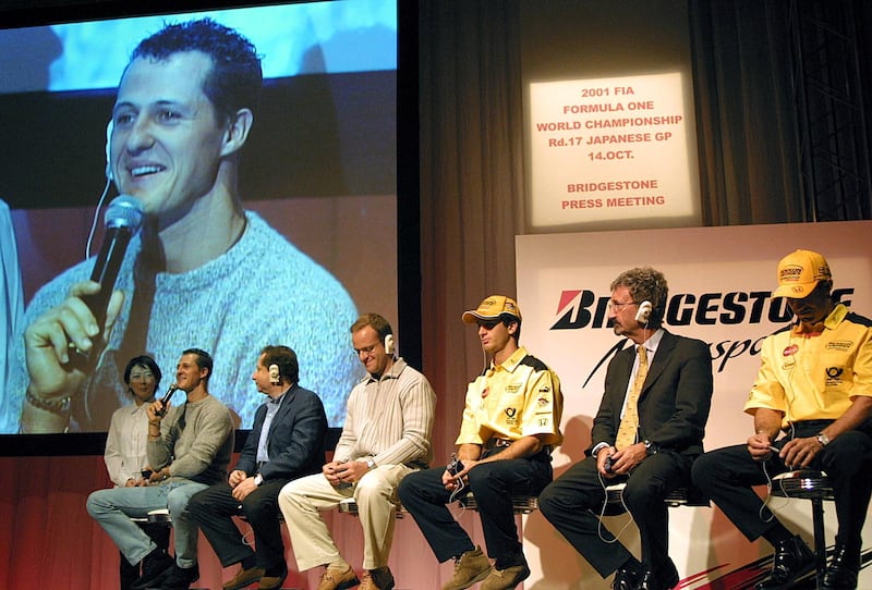 Eddie Jordan (second right) watches on as then three-time World Champion Michael Schumacher speaks during a press conference ahead of the 2001 Japanese GP. Jordan gave the German, who would ultimately win a total of seven drivers championship titles, his F1 debut in 1991. Photograph: Toshifumi Kitamura/AFP via Getty Images