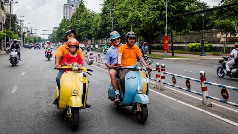 See the city with  Vietnam Vespa Adventures