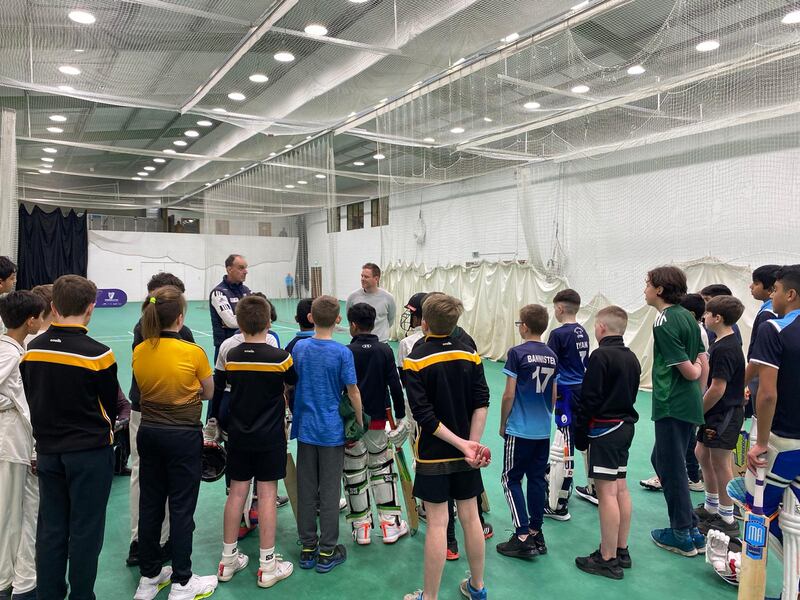 Eoin Morgan joins Brían O'Rourke at a youth coaching session in North County Cricket Club, Dublin. Photograph: Cricket Leinster