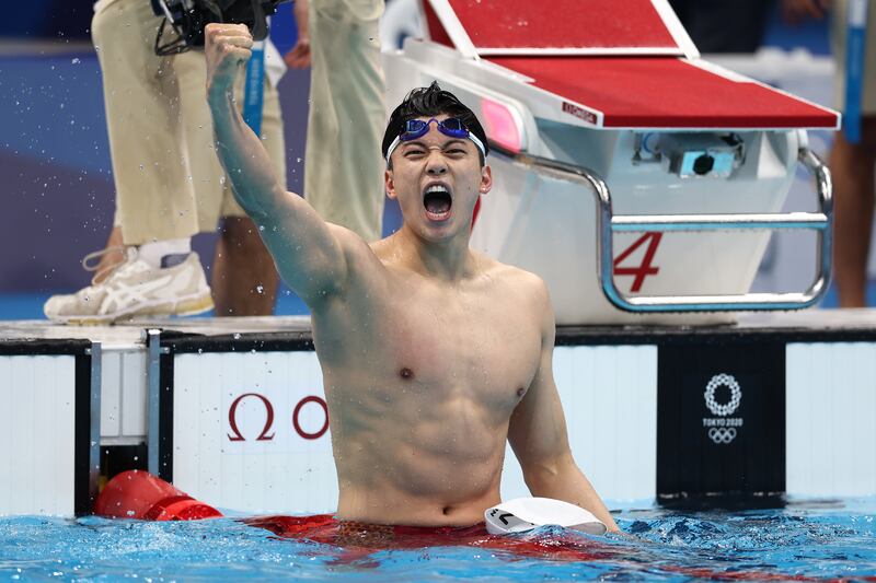 China's Shun Wang celebrates after winning a gold medal and breaking the Asian record in the Men's 200m Individual Medley at the Tokyo Olympics. Photograph: Clive Rose/Getty Images