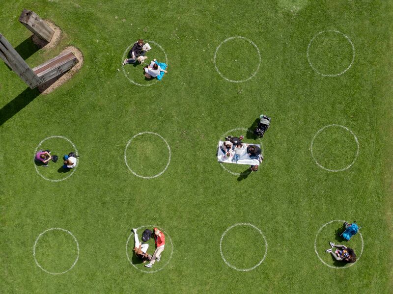 Visitors to the Royal Hospital Kilmainhan on the front lawn of the Irish Museum of Modern Art, within socially distant painted circles complying with Covid-19 precautions. Photograph: Alan Betson