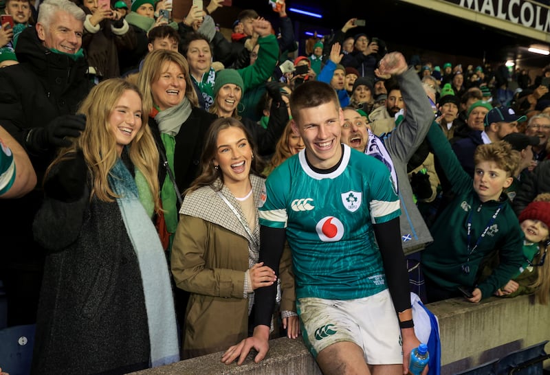 Sam Prendergast with partner Anna Walsh and family after Ireland's win during the Six Nations at Murrayfield. Photograph: Dan Sheridan/Inpho