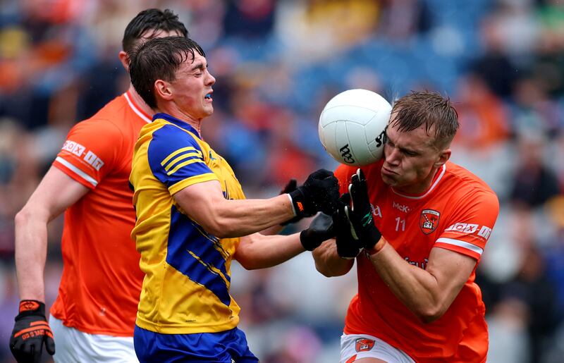 Roscommon’s Robbie Dolan and Rian O'Neill of Armagh. Photograph: James Crombie/Inpho