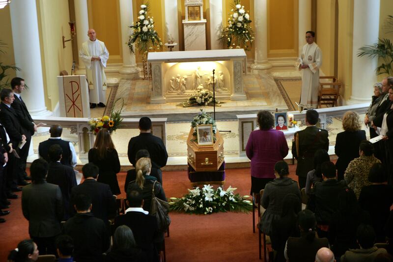 Colleagues mourn the death of Celia Ferrer de Jesus, the nurse and mother from the Philippines who worked at Our Lady's Hospice Harold's Cross and who died after her home was flooded. Photograph: Matt Kavanagh